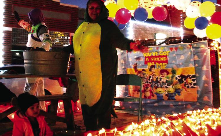 BEST OF SHOW Alice Briseno and Family won the Best of Show in the 2023 Light Christmas Parade with a ‘Toy Story’ themed float. | WHITNEY DORSETT PHOTO