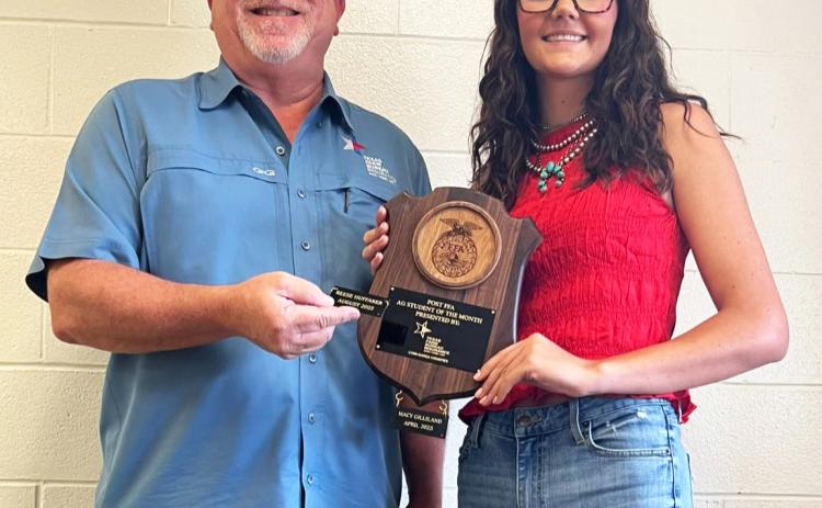 Texas Farm Bureau Insurance recently named Reese Huffaker of Post FFA Ag Student of the Month; agent Ron Francis presented the award. | COURTESY PHOTO