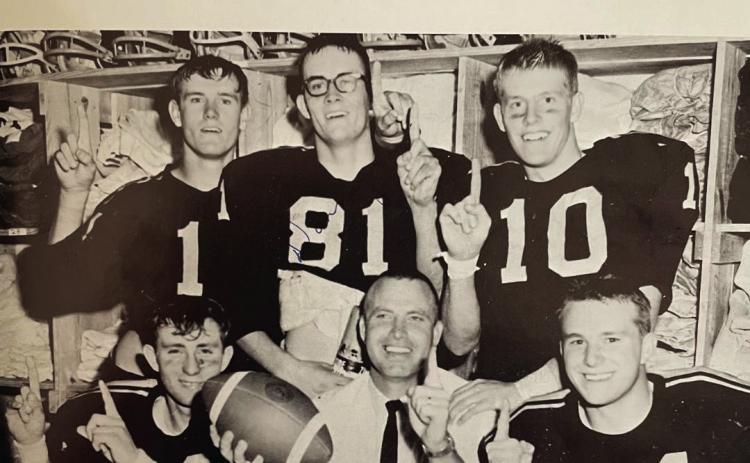 Antelopes celebrate after the win over D City. With Coach Glynn Gregg are Davis Heaton, Donny Windham, Dick Kennedy, Jimmie Bartlett and Paul Walker.