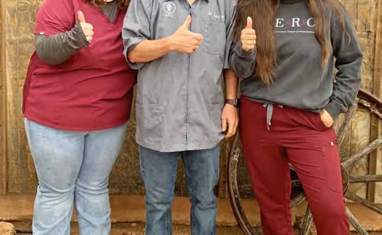 RURAL EXTERNSHIP Texas A&amp;M Veterinary School students Racquel Rodriguez and Allie Walker spent two weeks learning in real-life situations with Dr. Kerry Wink of Post (center). | COURTESY PHOTO