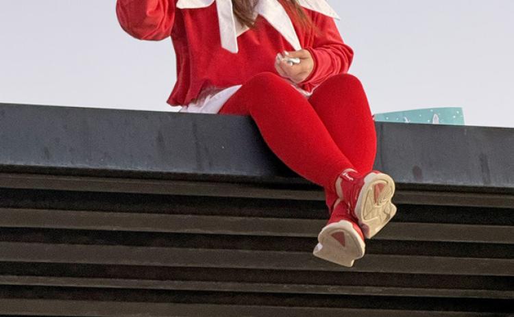 ONE SMILE AT A TIME In a season defined by giving, it turns out the brightest gifts at Post Elementary aren’t wrapped in ribbon; they are delivered each morning, one smile at a time—by the school’s own personal Elf on the canopy. | COURTESY PHOTO