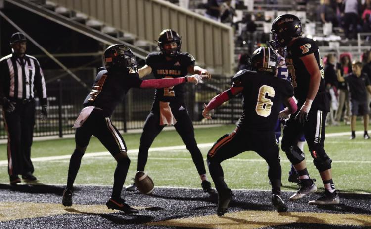 Antelopes celebrate in the end zone. | ABIGAIL RODRIGUEZ PHOTOS