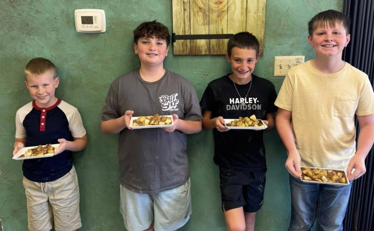 FOOD CHALLENGE Garza County 4-H offers an array of classes for its members, including the Food Challenge. Members learn nutrition facts, diet portions and practice building a visually appealing plate. Challengers, from left, were Connor Griffin, Cooper Britton, Bryson Bloomingdale and Aaron Brooks. | COURTESY PHOTO