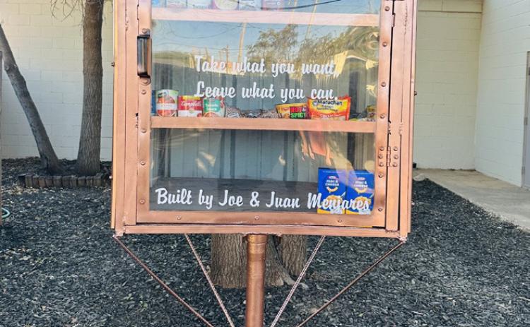COMMUNITY RESOURCE The new Blessing Box, provided by Ricky and Joanna Walters, is located in front of the Post Rotary Club building and offers food and other necessities to those in need. | COURTESY PHOTO