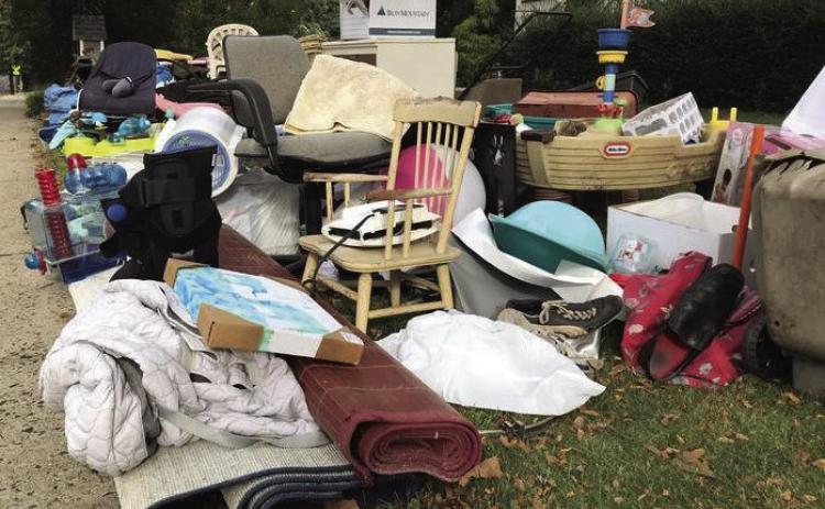 Council votes to discontinue curbside trash pickup