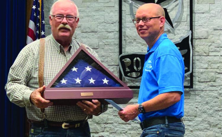 COUNCILMAN RECOGNIZED, Mayor Marvin Self is shown giving a flag that has flown over Post to Councilman Jeff Hood, in recognition by the city after serving five years which started as an appointed position in 2019. | ANNA GIBSON PHOTO
