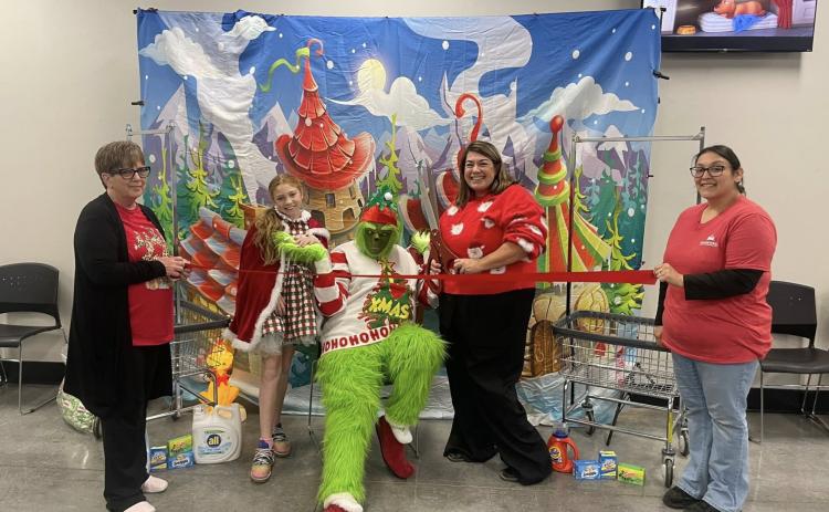 SPECIAL GUIEST Antelope Wash ‘N‘ Dry self-service laundromat celebrated their one-year anniversary in Post Dec. 5 with a special holiday visitor—The Grinch! | COURTESY PHOTO