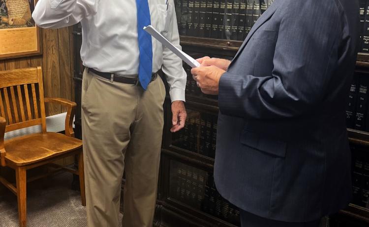 Garza County Judge Lee Norman recently administered the oath of qualification to County Judge-elect Ted Weems, who is unopposed on the November ballot, certifying that Weems meets the legal qualifications to serve as county judge. | COURTESY PHOTO