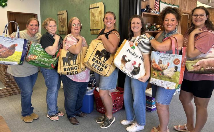 FEED SACK CREATIONS Participants in the Garza County AgriLife Extension adult sewing class created tote bags from repurposed feed sacks. | COURTESY PHOTO