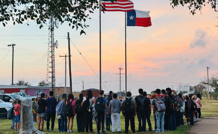 Southland ISD students gather in prayer before school Wednesday, Sept. 23, as part of See you at the Pole, an annual student-led prayer event held at school flagpoles across the country. | JENNIFER HOGAN