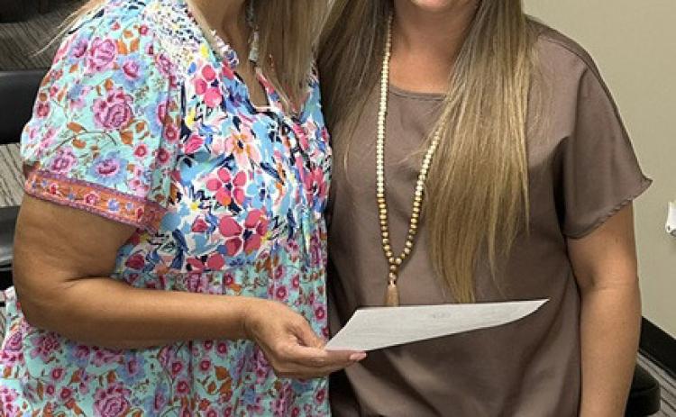 OATH ADMINISTERED Brandy Fannon, right, administered the oath of office to new Garza County Health Care District board member Janie Suber during the board’s June 25 meeting. | COURTESY PHOTO