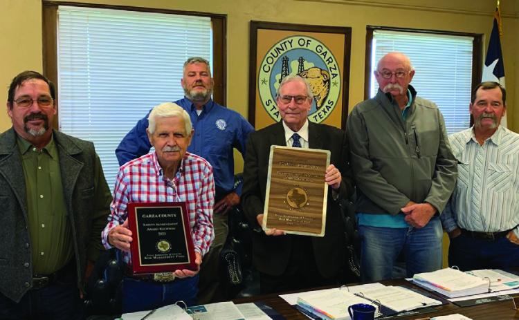 AWARD PRESENTATION, Steve Owens (in the back) from the Texas Association of Counties presented Garza County with the Safety Achievement Award and a plaque in Recognition for their 50 years of membership. Commissioners’picture from left to right are Giles Dalby Jr.,Ted Brannon, Judge Lee Norman, KimWilks, and Jeff Williams. | ANNA GIBSON PHOTO