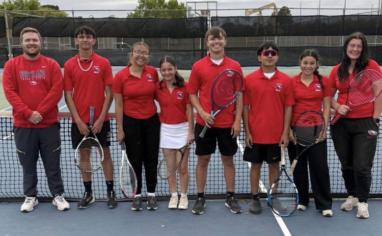 REGION BOUND Varsity Eagles and Lady Eagles team photo after district competition, April 7. COURTESY PHOTO