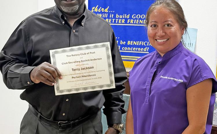 PERFECT ATTENDANCE Terry Jackson (left) received the Post Texas Rotary Club’s Perfect Attendance Award from Xochitl Anderton during a recent club meeting in recognition of his outstanding attendance. | STEPHANIE ALLEN