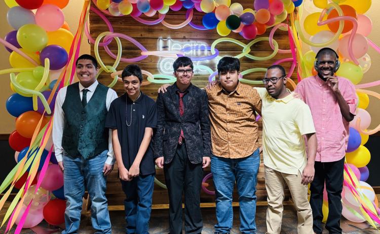 ALL SMILES Malachi Delgado, Adrian Trinidad, Jayden Pewitt, Jafet Rodriguez, Micah Gonzales and Zaidyn Green posed in front of a balloon backdrop at the Special Services Prom on April 15 in Lubbock. | COURTESY PHOTO