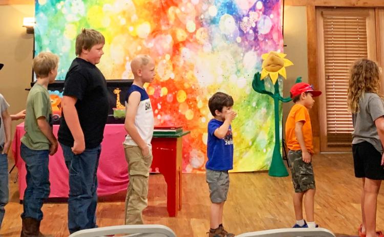 LIBRARY MAGIC The Post Public Library held a special event with“Rick the Magician”during the summer reading program at the Heritage House last Tuesday. Students enjoyed the magic tricks, Bruiser the bunny, and balloon animals. | POST DISPATCH