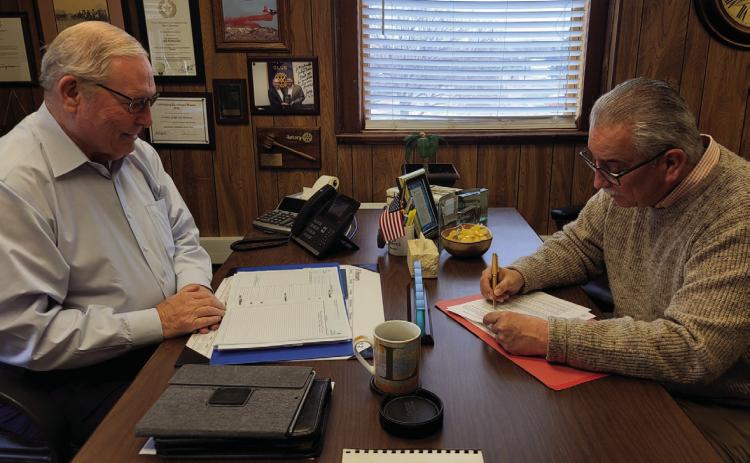 County Judge Lee Norman and Warden Rick Martinez signed off on Texas Jail Commission requirements for the Dalby prison bed expansion to 1024 beds. Photo Provided