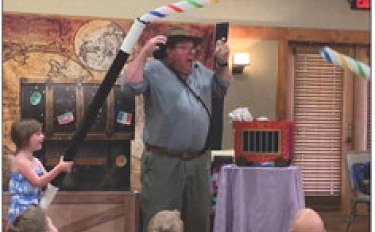 LIBRARY MAGIC Pretty Darn Amazing Productions with Wisconsin Johnson by Rick and Kelley De Lung performed for the children and adults who participated in the Public Library summer reading program. The performance was held at the Heritage House Friday. | ANNA GIBSON
