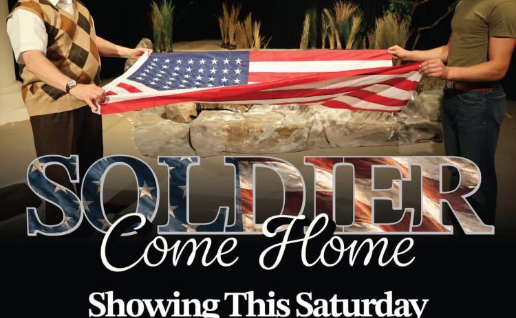 HONORING SERVICE Two generations hold the American flag during a scene from Ragtown Gospel Theater’s Soldier Come Home, which continues with a 3 p.m. performance Saturday and honors veterans through a story of healing, faith and sacrifice. | COURTESY PHOTO