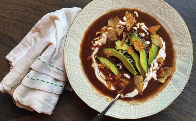 MEXICAN SOUP Sopa Tarasca a traditional Mexican soup that is rich and hearty dish features a delicious blend of flavors, combining ingredients of tomatoes, garlic, onion, and various spices. The soup is enriched with chicken and garnished with avocado, cheese, and sour cream, providing a delightful contrast of textures and tastes. | ANGELINA LARUE PHOTO