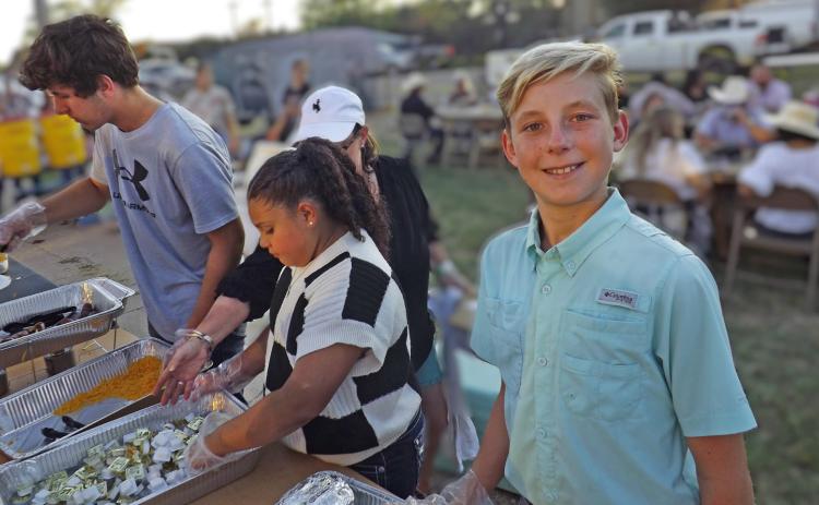 YUM FUN Garza County Junior Livestock members served dinner for their sponsors during last year’s gala. Be sure to buy your tickets now for the 2025 GCJLA gala on Oct. 18. Call Matt Dorsett at (806) 778-0562. | STAFF PHOTO